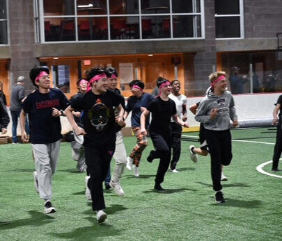 Briggs running during a dorm dodgeball game