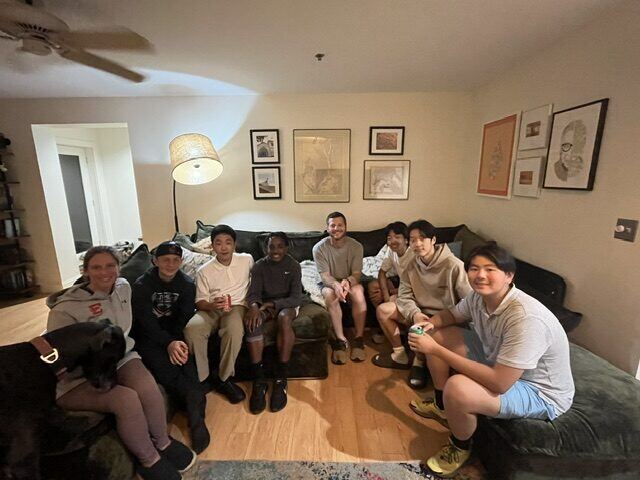 Briggs and friends hanging out in a dorm common room