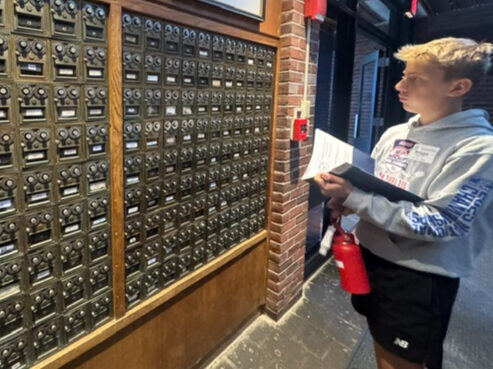 Briggs checking his mailbox at Eaglebrook