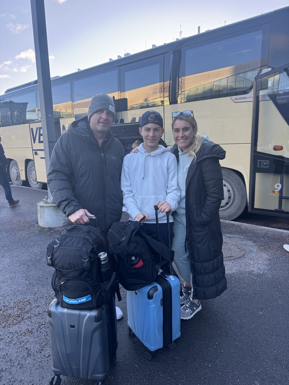 Briggs and his parents arriving in Scandinavia for his hockey trip