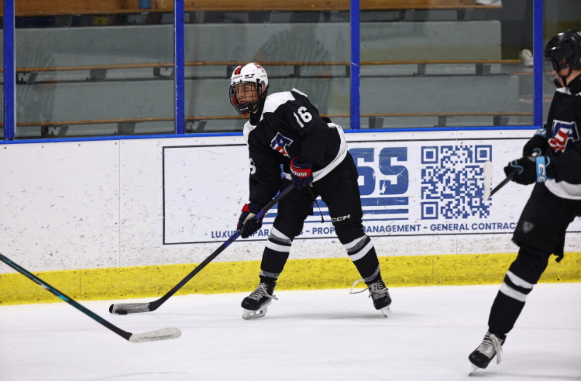 Briggs taking a shot in a black jersey
