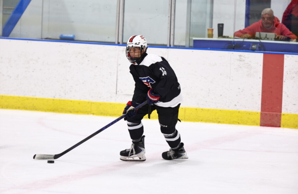 Briggs controlling the puck on the ice