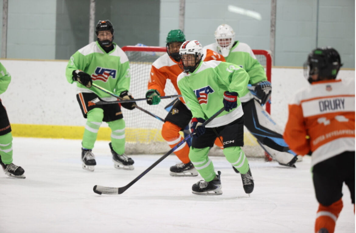 Briggs in game action wearing a green jersey
